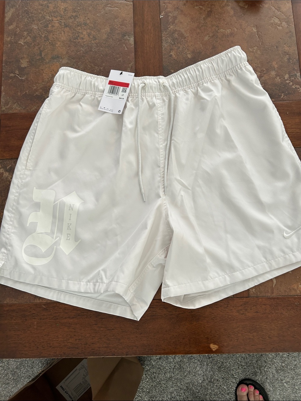 Nike Men’s White Swim Trunks with Subtle Logo
